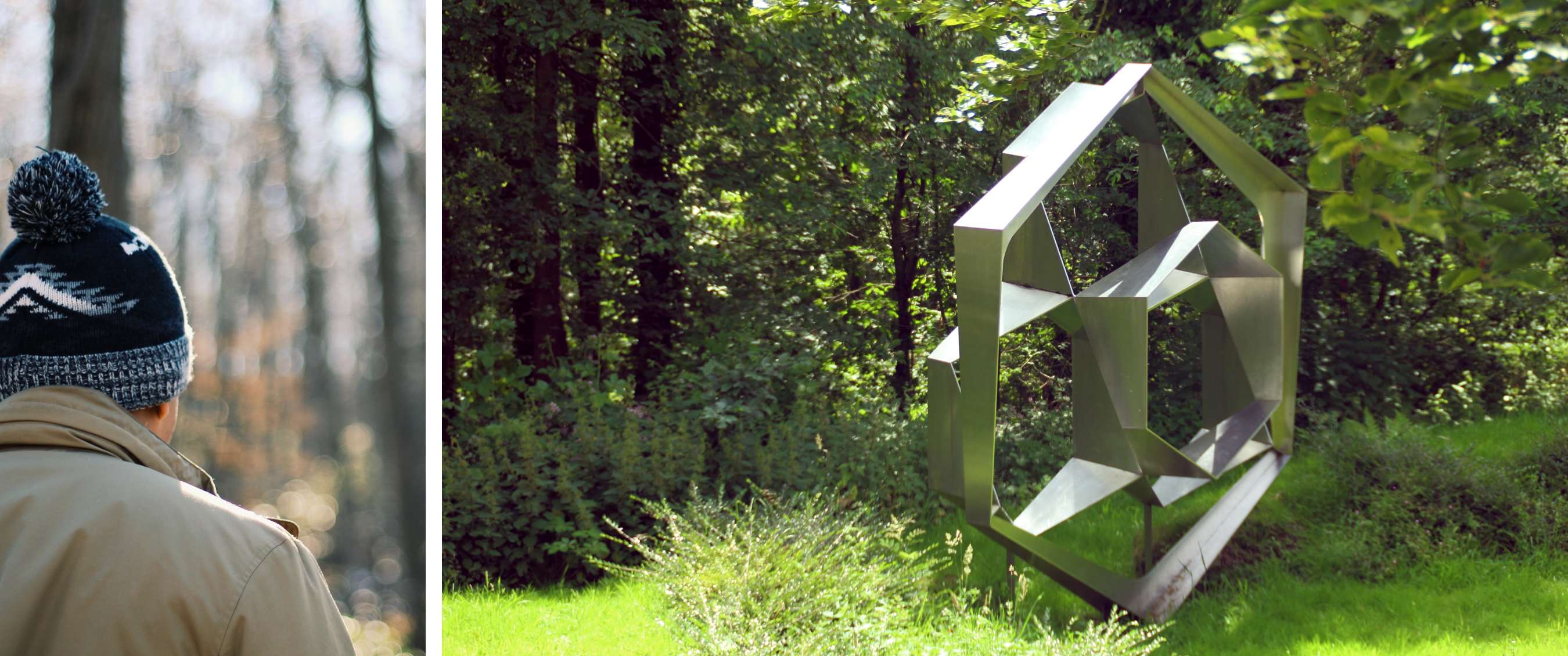 Sculpture métallique abstraite aux formes angulaires dans une clairière entourée d’arbres verts.